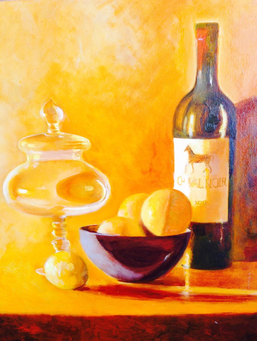 Glass carafe with oranges and lemon