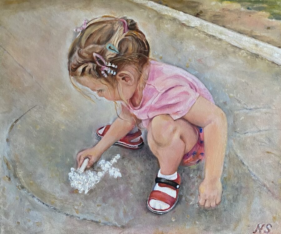 Little Girl Drawing with chalk