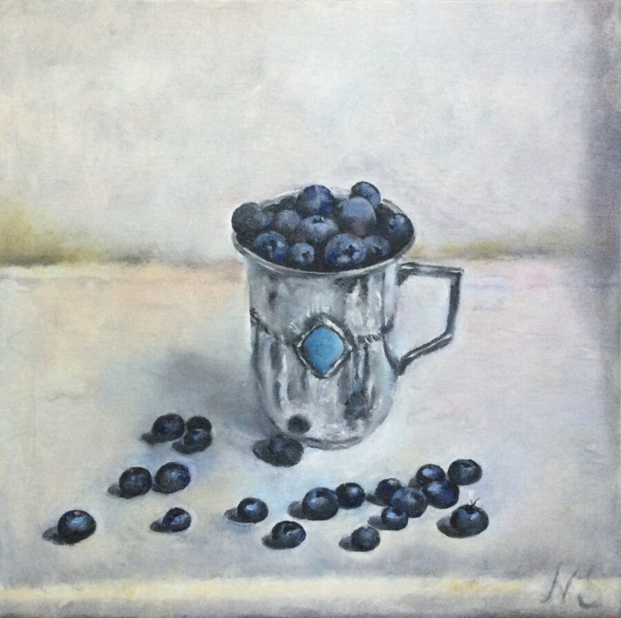 Blueberries in a silver cup
