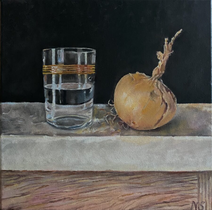 Still life with an onion and a glass of water